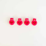 four red stitch holders