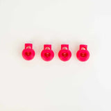 four red stitch holders