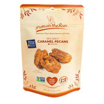 Packaged snack with 'Nuts on the Run' branding and caramel pecans on a beige background